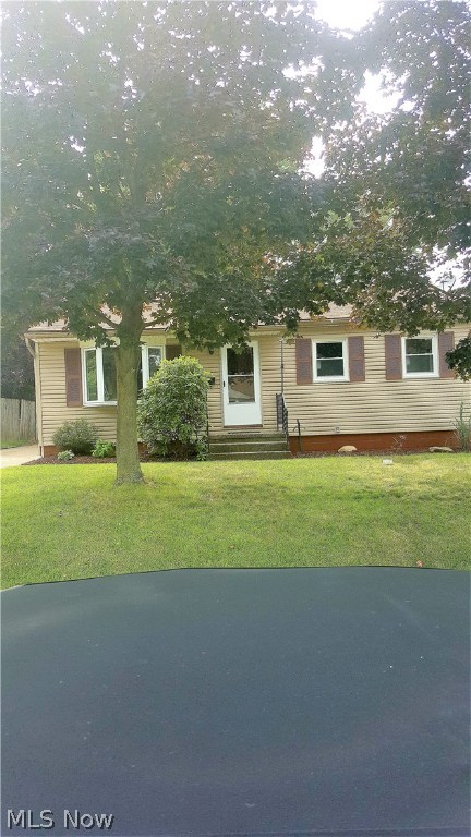 Welcome to 136 Hillman, You will love this adorable 3 bedroom ranch. Perfect starter home or great alternative to condo living.   This home has brand new double pane windows, brand new carpet, interior has been freshly painted.  Roof, siding and furnace were replaced approximately 2007, central air installed in 2008.  Updated kitchen that is fully applianced, updated bathroom, rec room and  storage room  in the basement and so much more.  This home is nearly 1200 square feet of living area with the large rec room in the basement. The outdoor has a patio area with a pergola , detached garage with an addition for extra storage and partially fenced in yard.  This lovely home is move in ready.....just waiting for its new owners.  Call today for your private showing.