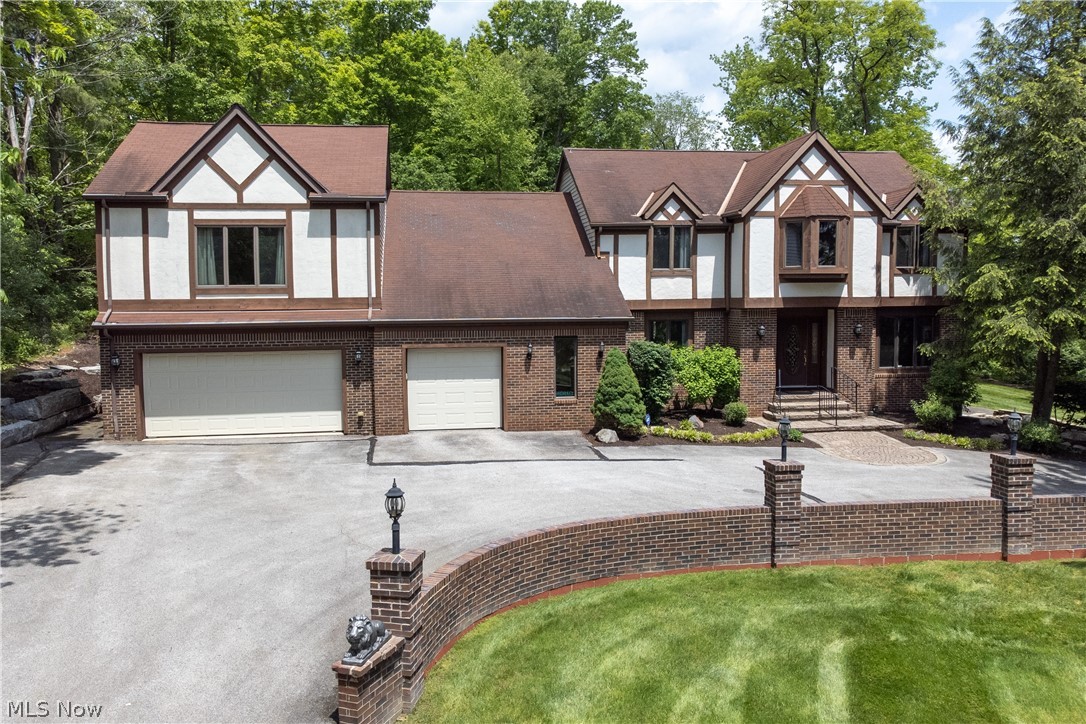 Welcome to 77 Carr Rd—A Stunning Retreat in the Heart of Hinckley Nestled on 1.78 acres, this breathtaking 5-bedroom, 4.5-bathroom home offers over 3,500 sq ft of thoughtfully designed living space. Built in 1987, this exceptional residence seamlessly blends comfort and modern amenities with timeless charm. Step into the stylish kitchen, where stainless steel appliances, granite countertops, a spacious island, and double ovens make meal preparation effortless. A walk-in pantry, den/office, and convenient half bath enhance functionality—perfect for hosting guests. Adjacent to the kitchen, a spacious formal dining room with an additional seating area sets the stage for elegant gatherings. The grand living room features soaring two-story vaulted ceilings and a cozy fireplace, creating an inviting atmosphere for relaxation. Just beyond, a screened-in porch offers serene backyard views and a half-court basketball setup, while the adjoining sunroom—with its skylights and cedar lined ceiling—fills the space with natural light. Upstairs, the luxurious primary suite boasts a spa-like bathroom and a private deck overlooking the scenic grounds. A spacious secondary suite includes an oversized bedroom, full bath, and walk-in closet, complemented by 3 additional bedrooms down the hall and a full bathroom. The walk-out basement expands your living space with a full bathroom, an office/workout room, and an informal living area. Outside, a circular driveway lined with unfinished granite adds character, while a koi pond and an oversized shed with a garage door provide ample space for a workshop or storage. The three-car heated garage ensures plenty of room for parking, a workshop, and extra storage for bikes and appliances. This remarkable home offers comfort, convenience, and a touch of luxury—all in a prime location. Don’t miss your chance to make 77 Carr Rd your own.