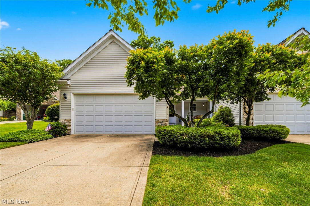 Beautiful condo ready for you to move in located in beautiful Auburn Hills with hills and great views.  Both the living room and kitchen have hardwood floors. Living room has a gas fireplace, lots of windows and access to a deck with privacy and beautiful views.  Upstairs you will find two bedrooms, master with large walk in closets and a door leading to your deck.  Finished lower level with large full size windows letting in lots of light.  Access to your patio with the same beautiful views and privacy.  You will also find an additional bedroom and bathroom and a large area off by itself for storage.  Recent updates since 2023 include new carpeting, fresh paint, new bathroom windows and 3 new storm doors.