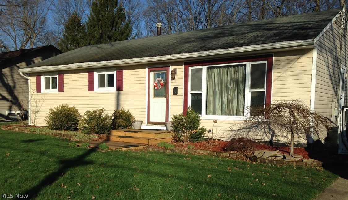 Welcome home to this beautifully maintained and charming ranch.  This "move in ready" home offers original hardwood floors through-out.  The large living room opens up into the dining and kitchen areas.  The deck off the dining overlooks a huge backyard that is fantastic for entertaining.  The partially finished basement is perfect for added extra living space.  Located right in the heart of Medina and is just blocks from Medina Schools,  Memorial Park and "the SQUARE".  Come see first floor living at its finest!!  Home warranty included.  City of Medina has confirmed that there is ample space for a garage to be built.
