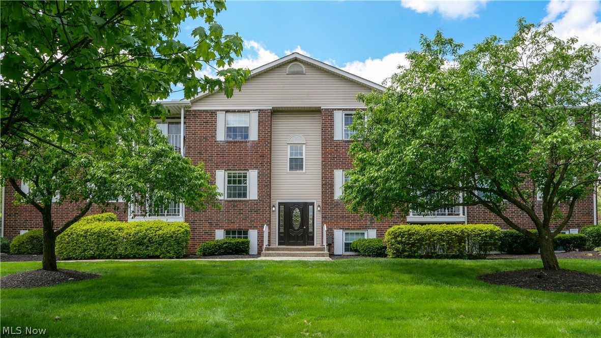 move in ready updated first floor condo in great Twinsburg location.  This condo offers a recently updated kitchen and bathroom, luxury vinyl flooring and a lovely brick patio off the living room.  The kitchen has been recently updated kitchen with custom white cabinets, granite counter tops, tiled backsplash and stainless steel appliances.  there is a dedicated dining space, living room and two spacious bedrooms.  The full bathroom has also recently been updated and features a beautiful walk in tiled shower, newer vanity, toilet and tiled flooring.   
The condo has a covered parking space as well as additional uncovered parking.  There is also a common laundry room inside the building.