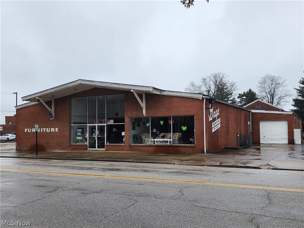 GREAT NEW PRICE! Step into the heart of a growing commercial district with this solid, built-to-last property at 4611 Park Avenue, now offered at a compelling new value. Located just steps from Main Ave, this building invites you to join the many local businesses revitalizing downtown Ashtabula. Offering 11,100 sq. ft. of versatile retail space, the wide-open floor plan provides a blank canvas for your vision. The functional square footage continues into a finished basement boasting impressive 12-foot ceilings, making it an ideal candidate for conversion into a gym, modern office suite, or expanded showroom. 
The property is fully equipped for professional operations, featuring private offices and meeting rooms, two well-sized restrooms, and a convenient kitchenette. Logistics are a breeze thanks to the attached one-bay loading area featuring a 12-foot overhead door. High-value updates offer peace of mind for the next owner, including a newer roof over the main building and a new furnace for the lower level. To top it off, the sale includes the adjacent parcel to the north, providing essential off-street parking in a bustling downtown setting. Don't miss this opportunity to anchor your business in a thriving community at an incredible price.
