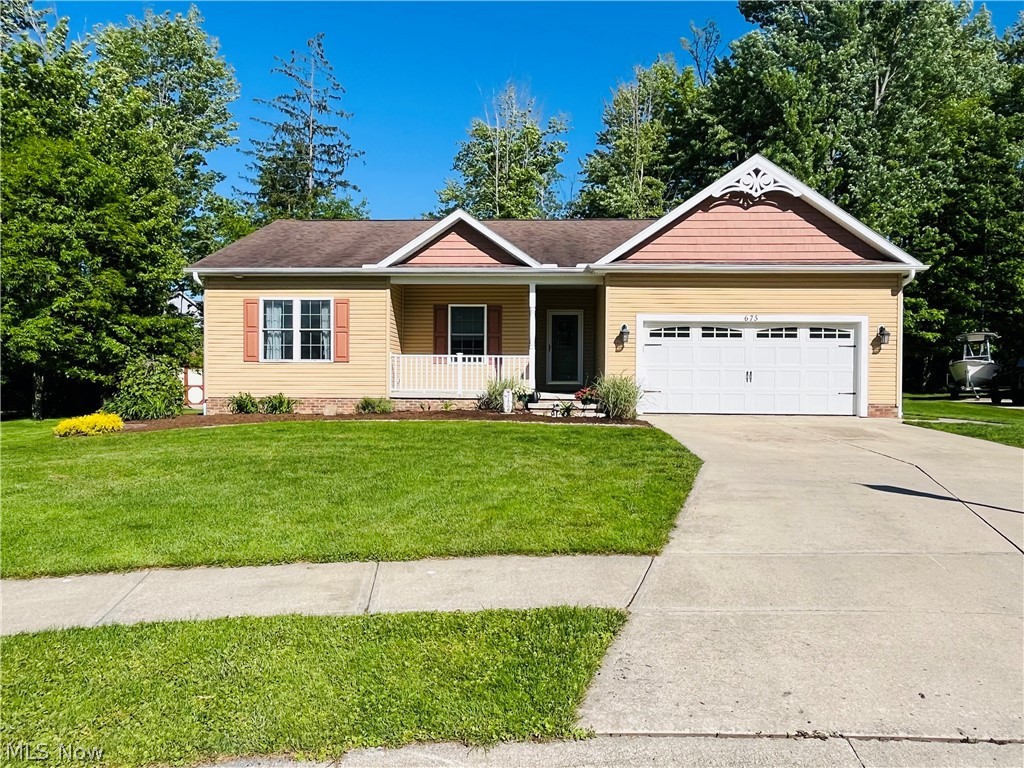 Welcome home to this custom cul-de-sac ranch in Geneva! All one floor living in impeccable condition, with abounding quality marks throughout. 3 beds, 2.5 baths over a full basement. The entry foyer offers custom ceramic tile flooring, welcoming you to the family room, offering timber and stone-faced gas fireplace, and views to the backyard. The exquisite and open kitchen/ dining area has custom cabinets, kitchen island, with roll-out drawers, all granite counters, and pantry. Just off the dining area, the quaint and sun-struck morning room/ 4 seasons room is an amazing and flexible bonus space. Owner's suite is spacious and private, with two double closets and vintage French-themed en suite. Claw-foot tub with chrome hardware. Gorgeous and well-appointed bathrooms. Custom built-ins and thoughtfully executed details throughout. Bamboo flooring. Crown molding. All nine foot ceilings. Hardwood oak steps to the basement. Basement offers full footprint, 1600+ square feet of partly finished space, fully covered in durable linoleum flooring (new). Dry-walled and primed hallway, with doors hung, leading to the future basement full bath, which is already pre-plumbed. Installed all custom and original landscaping in '21 and '22. All Trex deck installed in '23, paver patio in '24. Garden shed with solar lamp. Meticulously cared for - it's like a new home, but better. Just move in. The perfect blend of comfort, style, entertainment spaces, and enjoying your hobby gardens. Private back corner of property is a small, yet serene wooded escape for the nature lover. This is truly a rare find!