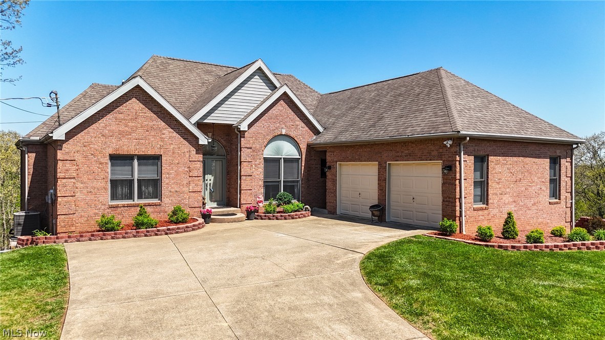 Spacious 4-bedroom, 3.5-bath brick ranch offering 3,568 sq ft of finished living space, including a fully finished basement. This well-maintained home features a newer HVAC system, hot water tank, and roof—providing peace of mind for years to come. Enjoy the beautifully updated landscaping, complete with a retaining wall, all situated on 1.16 acres. Additional highlights include a 2-car garage and plenty of room to relax, entertain, and enjoy the outdoors.