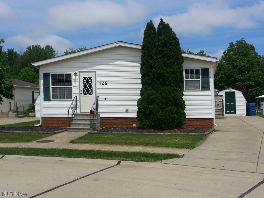 Welcome Home! This well maintained mobile home located in the Amherst Village community is a perfect first time home or your seasonal residence. 4 nice size bedrooms with the master suite separated from the rest of the bedrooms. The kitchen is a perfect size to prepare family meals and entertaining with it's informal eat in kitchen and separate dining room. Arrange your private tour today.