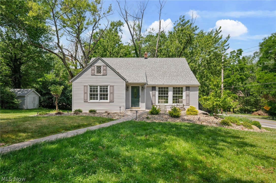 THIS COULD BE THE PLACE! Blending timeless charm with thoughtful updates, this inviting 4-bedroom, 2-full-bath Cape Cod is set on two parcels totaling just under a half-acre, offering exceptional space both inside and out. Freshly painted throughout in 2026, the home is move-in ready and filled with abundant natural light.

The main level showcases beautifully refinished original hardwood floors, creating warmth and character throughout the living spaces. The updated kitchen features elegant new stone countertops (2026), while a new roof installed in 2025 adds lasting value and peace of mind. Upstairs, you'll find two bedrooms with brand-new carpeting and ample storage.

The partially finished lower level expands the home's versatility with a full bath, making it ideal as a recreation room, home office, guest retreat, in-law suite, or additional living space to suit your needs. A separate entrance into the finished lower level enhances both convenience and functionality.

Outside, enjoy the privacy and possibilities of nearly half an acre across two parcels. The property also includes a storage shed, an attached one-car garage, and a driveway with parking for approximately six additional vehicles. For added convenience, an EV charging station is already installed and conveys with the home, making it easy to accommodate today's electric vehicle lifestyle.

Offering a rare combination of classic character, modern updates, generous outdoor space, and modern conveniences, this exceptional property is ready to welcome you home.