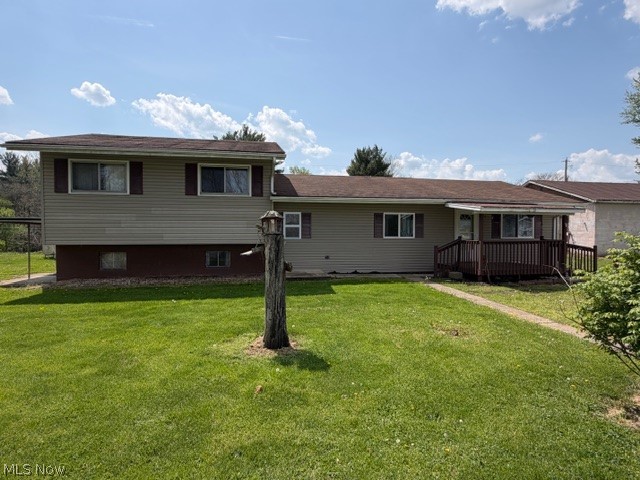 Located just 10 minutes from downtown, this solid bi-level home offers the perfect blend of a rural setting and convenience. Situated on 4 parcels totaling 0.88 acres, the property features a nice, flat yard with plenty of room to enjoy the outdoors. There is also a block building that was formerly the old co-op store. What could YOU do with this building? It's been used as a large storage area in recent years. Inside, you'll find 4 bedrooms, one being on the main floor and a 5th in the basement, offering flexibility for guests, a home office, hobby room, home gym, or just additional living space. With close to 2000 sq. ft., Ft there is room here for everything. While this property needs some cosmetic updates, it presents a wonderful opportunity to restore it to its former charming family home. With reasonable property taxes and no city income tax, this home offers both value and potential in a peaceful setting in Midway. AGENTS SEE PRIVATE REMARKS