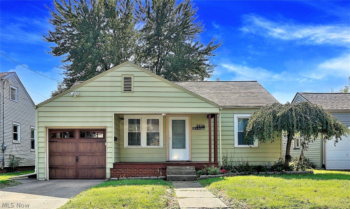 *Outstand Opportunity ~  One Floor Living Completely Remodeled MODERN RANCH Near Football Hall Of Fame Features 2 Bdrms, 1 Bathrm And Attached Garage! *Updated -> MOVE RIGHT IN!! *Concrete Driveway *FULLY FENCED IN Back Yard W/Wood Privacy Fencing, Firepit, Concrete PATIO +PLUS+ Brick Patio & Covered Front Porch! *Low Maintenance *Light Grey Walls & White Trim Throughout! *Living Rm W/Hardwood Floors *Dining FARMHOUSE Style Oversized Cage Brown & Black CHANDELIER, LUXURY Grey Plank Flooring W/Door To The Back Yard *Two Bedrooms Main Floor *Full Bathroom Updated W/Grey LUX Flooring, Fully SHIPLAPPED Walls, White SUBWAY TILE Tub & Shower Surround, Black Accent Mirror & Faucet, Double Caged Sconce Lighting, Fresh White Vanity & Sink *The Kitchen Showcases New Sealed BUTCHER BLOCK Countertops, Stainless Steel Sink, Black Accent Faucet W/Sprayer, White New Cabinets W/Oversized Black Hardware, Custom Knotty Pine Ceiling, Matching Ceiling Lights & Stainless Steel Refrigerator, Dishwasher, Sto