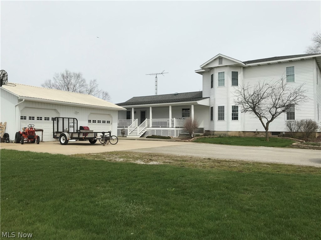Beautiful 2 story, 4 bedroom, 2 bath home on 7 acres.  2500 sq ft home that has updated kitchen & baths, large covered porch w/trex flooring, 7 year old roof, septic new in 2015, updated plumbing & wiring, central air, 1st floor laundry & updated windows (windows need trim put back up).  There is also a 26'x32' detached 2 car garage with a 16' lean to plus a storage shed.  Come take a look for yourself.