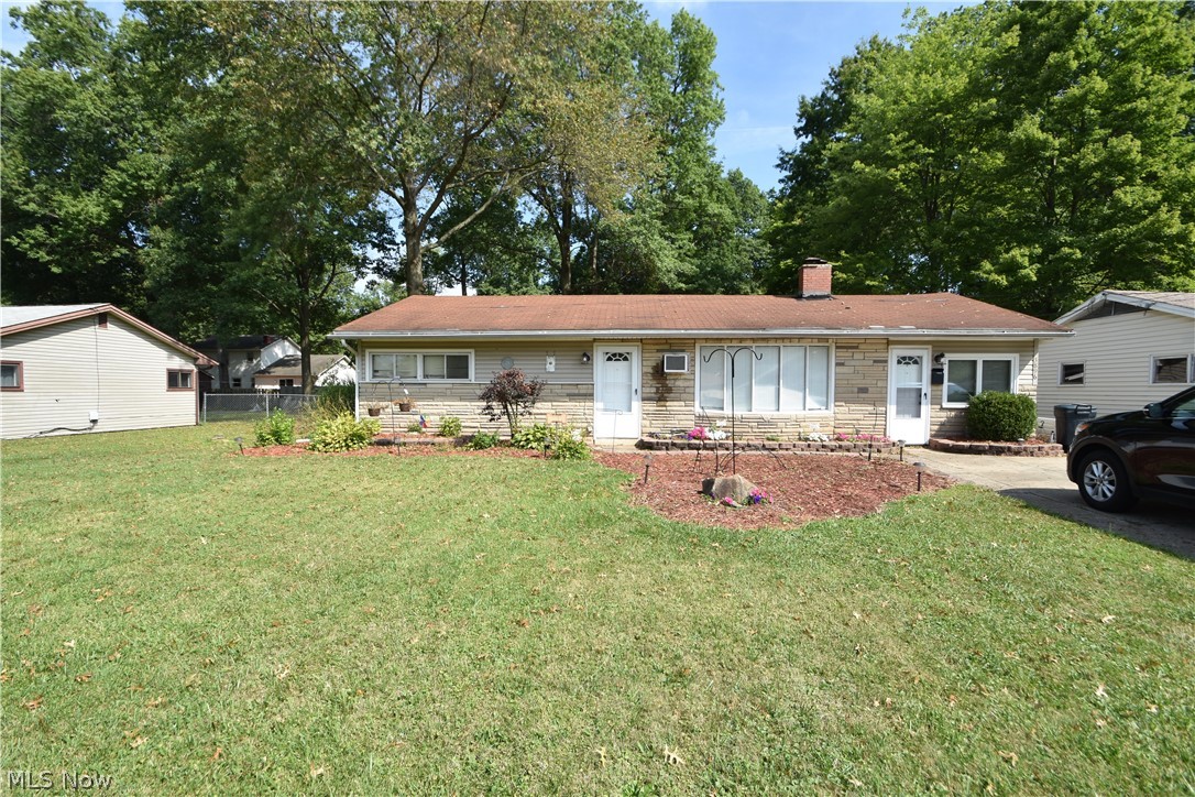 Welcome home to this charming 3 bedroom ranch in the heart of Austintown!  Enjoy the cozy fireplace in the main living area that has brand new vinyl flooring! If you are looking for some privacy this house dotes a second living area with brand new carpet and bonus room that could be your home office or additional bedroom!
