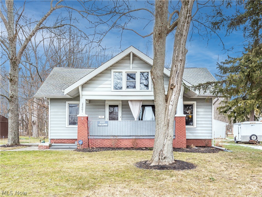 Welcome home to this meticulously maintained three-bedroom Cape Cod in Richmond Heights. The large living room has new flooring and features high ceilings with oversized windows overlooking the enclosed front porch. The recently remodeled kitchen has newer cabinets, granite countertops, subway tiles, and stainless-steel appliances. To finish out the main floor is a recently modeled full bathroom and a bedroom which can also serve as an office or walk-in closet.  On the second floor you will find two additional bedrooms and access to attic storage.  You will fall in love with the insulated 3.5 car garage which features two floor drains, newer garage doors, 220 line with 50-amp service, and oil resistant polyurethane floor coating. There is also additional attic storage in the garage.  To bring this all together, this home sits on a near half acre wooded lot with a park view.