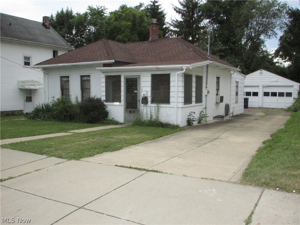 Excellent one floor living, investment, or starter home.  The laundry has been moved to the first floor.   A large kitchen opens to the living room.  There is a full basement, 2 car garage, updated roof, and more.