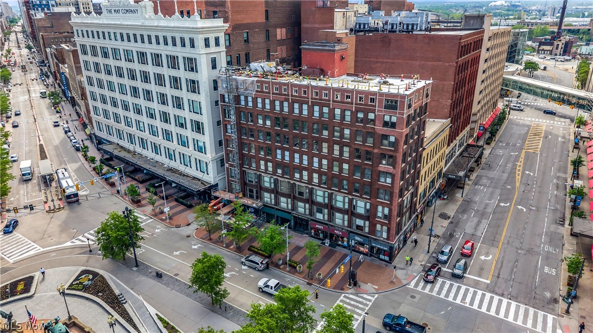 Experience true downtown living in this stunning 2-beds, 2-baths condo located in the historic Park Building at the heart of Cleveland’s iconic Public Square! The living room windows has a breathtaking forefront view of the monument is Soldiers’ & Sailors’. 

Inside, the condo features hardwood flooring, exposed brick accents, rich wood trim, and large windows that flood the home with natural light while showcasing downtown Cleveland’s skyline & historic architecture. The open-concept living & dining area creates an inviting atmosphere ideal for entertaining, relaxing, or working from home in style. The well-designed floor plan offers both comfort and functionality, complemented by spacious bedrooms, 2 full bathrooms, & the convenience of in-unit laundry. 
With parking in The May building for one car for $275 a month.

The Park Building itself continues to undergo significant capital improvements and renovations, with over $1 million already invested into ongoing building upgrades over the past two years. Current and planned improvements include roofing repairs, front entrance renovations, and additional building enhancements that continue to add long-term value and preserve the integrity of this historic building. Situated next to the Arcade, East 6th Street, & Tower City, residents enjoy immediate access to some of Cleveland’s premier restaurants, nightlife, shopping, & entertainment venues. The JACK Casino is just steps away, while the newly developed Sherwin-Williams Global Headquarters further strengthens the area’s appeal for professionals & investors alike. Also, just minutes from Rocket Mortgage FieldHouse, Progressive Field, North Coast Harbor, Lake Erie, & Cleveland’s expanding waterfront developments. This is a rare opportunity to own one of downtown Cleveland’s most centrally located condos, combining historic character, ongoing building investment, exceptional city views, and walkability in one of the city’s most recognizable & desirable​​‌​​​​‌​‌​​​‌‌​​​‌‌‌​​‌​​‌‌​​​​ locations!
