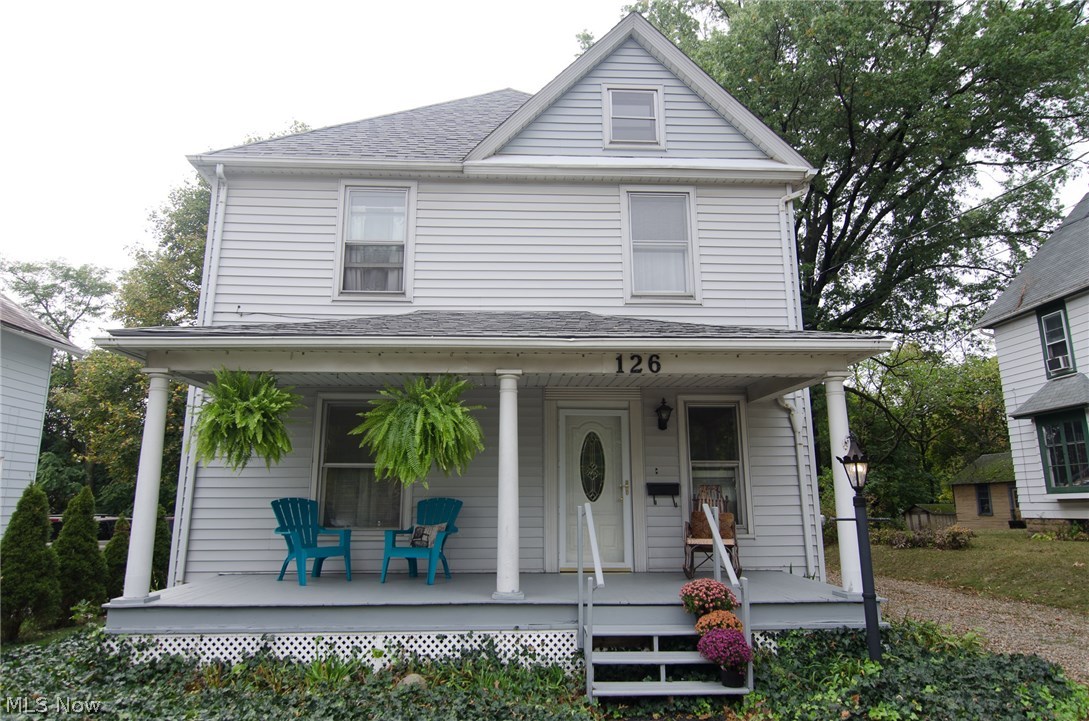 Absolutely charming colonial in the heart of Wadsworth!  From the hardwood floors with inlays, to base boards and archways, you will fall in love with all of the stunning original woodwork throughout this home.  Walk into the giant foyer, which would make a beautiful formal sitting or reading room.  The open living room flows right into the formal dining room then to the large kitchen.  The kitchen has lots of updates (2010) including tile floors, newer cabinets and counter tops, but has kept some of the original cabinetry that make this room unique and beautiful.  The range and dishwasher stay and the fridge and microwave are negotiable.  Up the lovely dark wood stairs to the 4 bedrooms and bathroom.  You will be amazed at the space on this floor.  A huge open center area will keep the family from running into each other!  There are 4 nice sized bedrooms, one with rustic brick of the exposed chimney.  In the bathroom there is a new vanity top & faucet, tile floor & updated lighting.