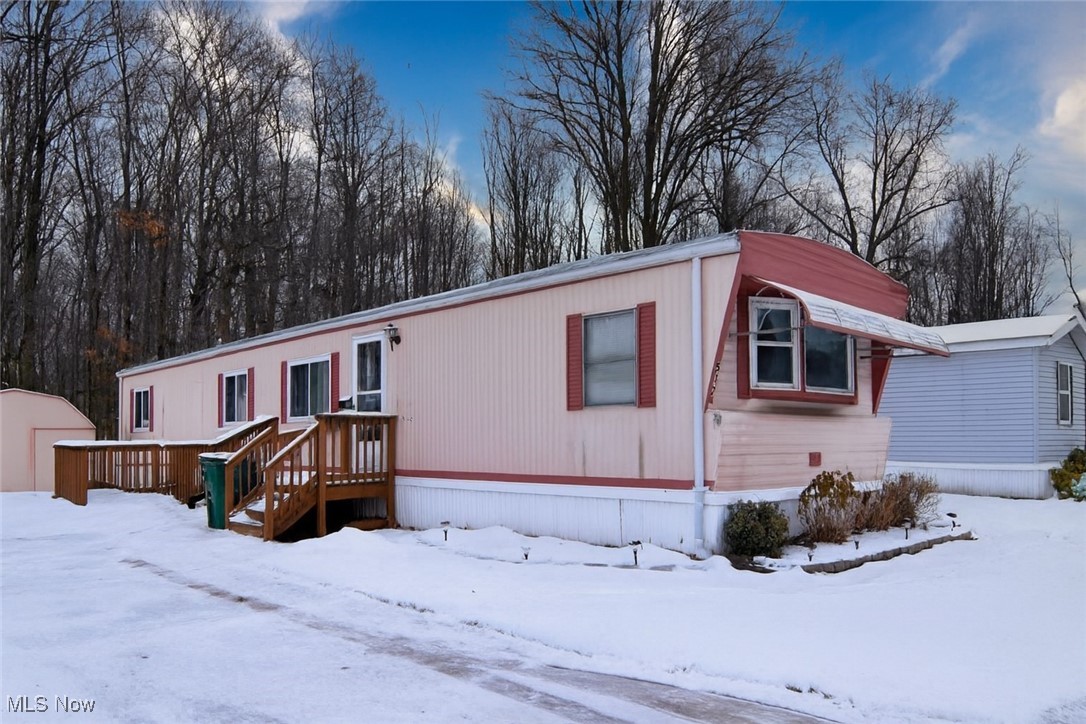 Move-in ready and beautifully updated mobile home! This home features 2 good-sized bedrooms and an updated full bath. Enjoy a spacious, open kitchen with plenty of room for dining, along with convenient first-floor laundry. Outside, you'll find a nice deck and a wheelchair-accessible ramp for easy entry. A great opportunity for comfortable, single-floor living!