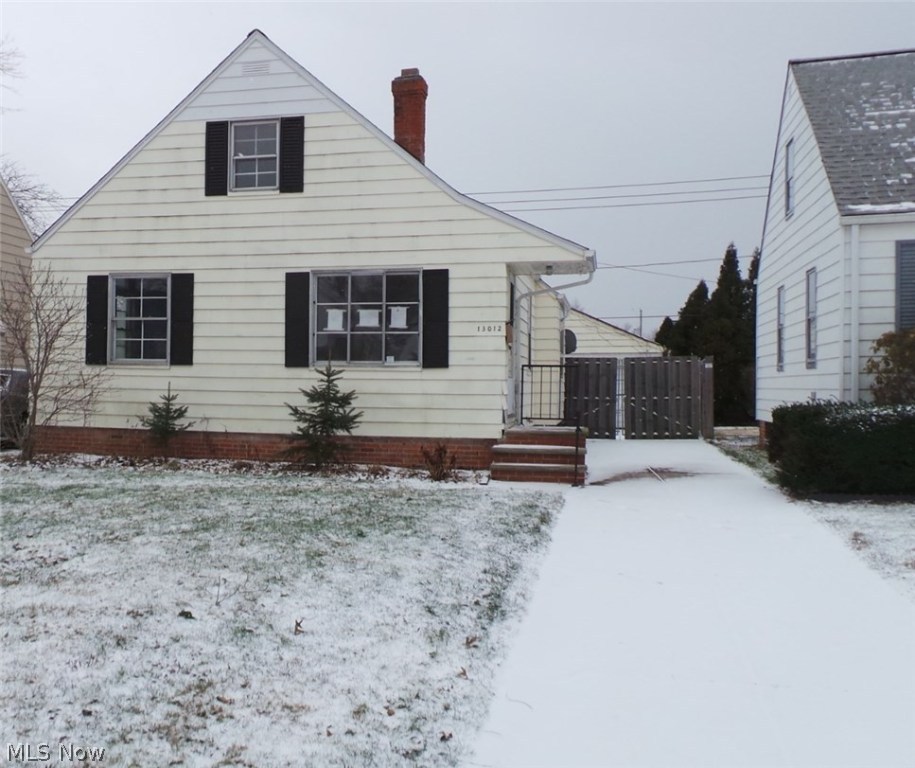 Three bedroom bungalow with lots of potential.  Hardwood floors, spacious kitchen.  Use your imagination and make it your own.  Property sold AS IS.