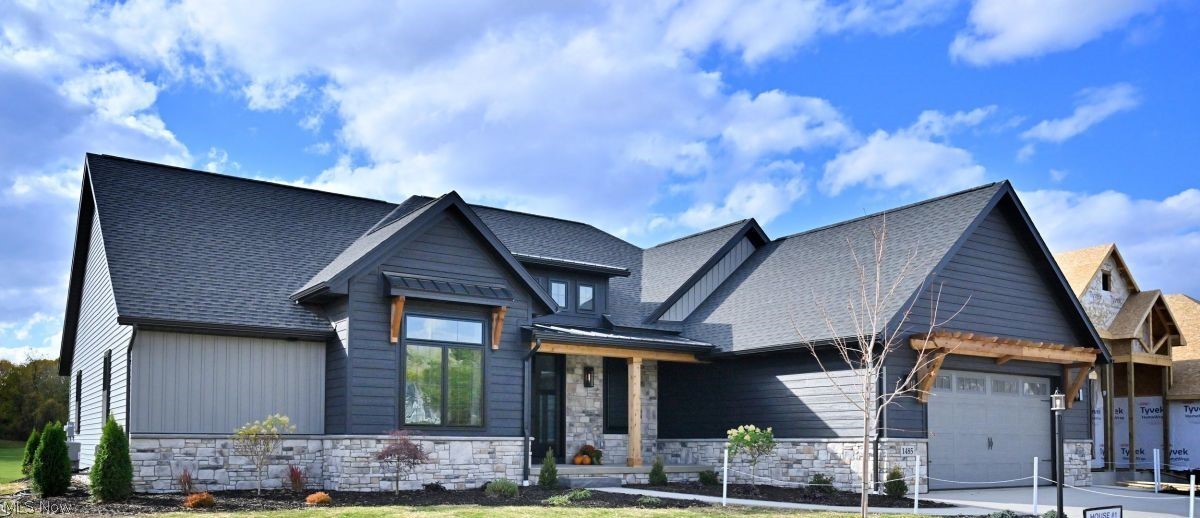 Stunning contemporary farmhouse, recently featured at the Stark and East Central Ohio BIA's Parade of homes at Augusta Lakes. Situated as Golf Course lot, this incredible ranch consisted of 2,477 sq. ft. 3 bedrooms and office, Dutch creek cabinetry, see-thru gas fireplace, Murphy Door leading to Butlers pantry, trayed and beamed great room ceiling and numerous other extraordinary quality items in attached brochure.