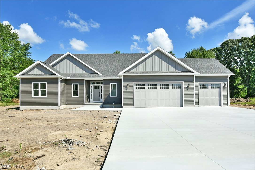 Find extravagance right in your own backyard! Welcome home to this brand-new Cortland construction, ready to excite from the inside out with its high style and immersive surroundings. An instant curb appeal standout, the complimenting grey and subtle green exterior is accented with bright white trim to create a sleek, modern look. A three-car garage adds to the appeal, found at the end of its cement driveway. Around the back, a corner patio overlooks the backyard. Through the decorative front door, the elegantly lit foyer transitions into the main great room where vaulted ceilings overlook the window lined rear wall. A towering black mantle houses the gas fireplace as recessed lighting shines from above. Natural colored, hardwood style flooring runs underfoot and continues throughout the home. Formal dining resides on the far end next to the elegantly appointed kitchen, complete with stone countertops, decorative lighting and modern appliances that join the advantageous center island. A short hall leads past garage and closet space before finding a half bath. Meanwhile, nearby a pair of spacious guest bedrooms flank an additional full bath. The oversized master suite is located opposite the foyer, just past first floor laundry services. The master continues to impress with its dual closets and remarkable full private bath with a glass door shower.