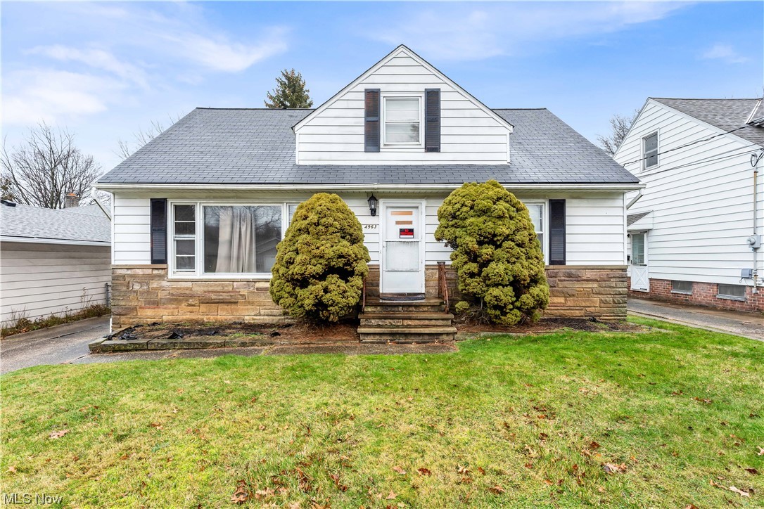 Welcome to this wonderful cape cod style home with over 1500 sq. ft. of living space.  This home boasts a large eat in kitchen with all appliances included.  There are 3 bedrooms with one room running the entire length of the house.  Large living room with hardwood floors and plenty of natural lighting.  In fact hardwood floors run under all carpet.  Super clean basement with washer and dryer.  The furnace was replaced in May.  The hot water tank was serviced in May.  Motor in central air previously replaced and sump pump in basement only a few years old. Selling as is.