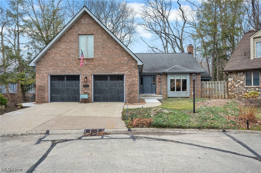 This stunning open concept home in the beautiful park-like setting of Rocky River’s private Gatehouse Development is ready to move right in!   Step into the open concept living room with its wonderful cathedral ceiling making it feel spacious and airy.  A beautiful ventless gas-burning fireplace anchors the room with space for a dining area as well as access to a private screened in patio with built-in gas grill.  A completely renovated eat-in kitchen provides beautiful new cabinetry, granite counters and high quality appliances.  With a spacious primary bedroom with ensuite, a laundry room, and a half bath also on the main floor, one floor living can be yours.  But when you need extra space, you’ll find two additional bedrooms and a full bath on the second floor.  The rooms are spacious and comfy and provide an enormous amount of storage!   Practically everything has been newly updated in the last two years, right down to the studs.  New plumbing, electric, HVAC, appliances, Anderson windows, and more offers maintenance free living for years to come.  Worried you’ll need more space down the road?  A huge unfinished basement awaits you, offering the opportunity to almost double your square footage.  This beauty in its prime location won’t last long, so call for your showing today!