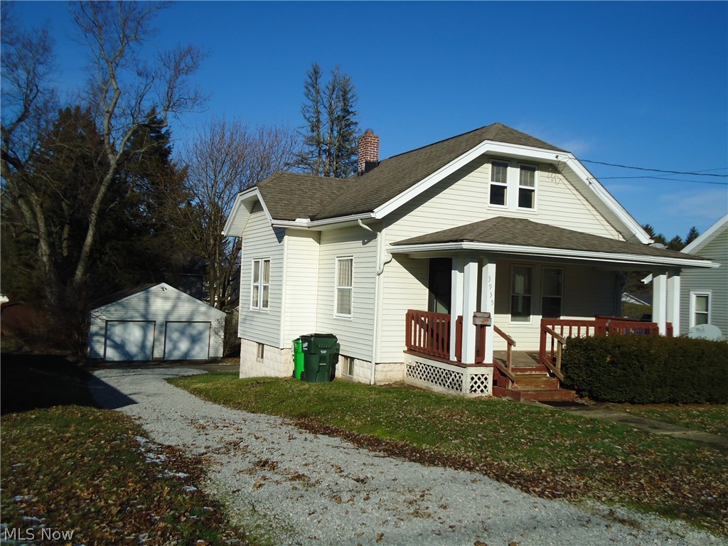 Great neighborhood location in Mogadore...close to everything!  This home features character, curb appeal, & a covered front porch....a perfect place to enjoy an evening outdoors.  The 1st floor Bedroom, Living room, & Dining room with with beautiful  natural woodwork make for a comfortable setting throughout the 1st floor.  Upstairs, is the a large 2nd Bedroom with ample storage space.    The lower level is a walk out to the back yard & features a workroom/craft room area & laundry with extra storage.  The detached 2 car garage offers plenty of room for bicycles, yard tools and equipment.  This is a home that you'll be happy to come home to!  
The seller is providing a one year home warranty with America's Preferred Home Warranty to the new buyer for added peace of mind.
Call today for your private viewing.