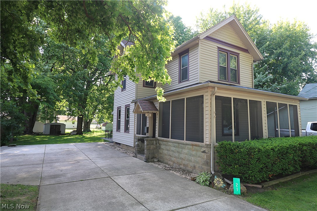 Charming 4-bedroom, 2-bath home full of character and opportunity! The spacious primary bath features a classic clawfoot bathtub, adding timeless charm to the home. Enjoy relaxing mornings or entertaining guests on the large screened-in front porch. Recent replacement windows provide added efficiency and comfort. Parking is plentiful with a large concrete parking pad on the south side of the property and an additional driveway on the north side. Offering great potential, this home is ready for your personal updates and finishing touches to make it truly shine. Conveniently located within walking distance of one of the area's premier parks featuring newer basketball courts, two pump tracks, a fenced soft-surface playground, and baseball fields. The reduced traffic of a one-way street adds safety and peace of mind.