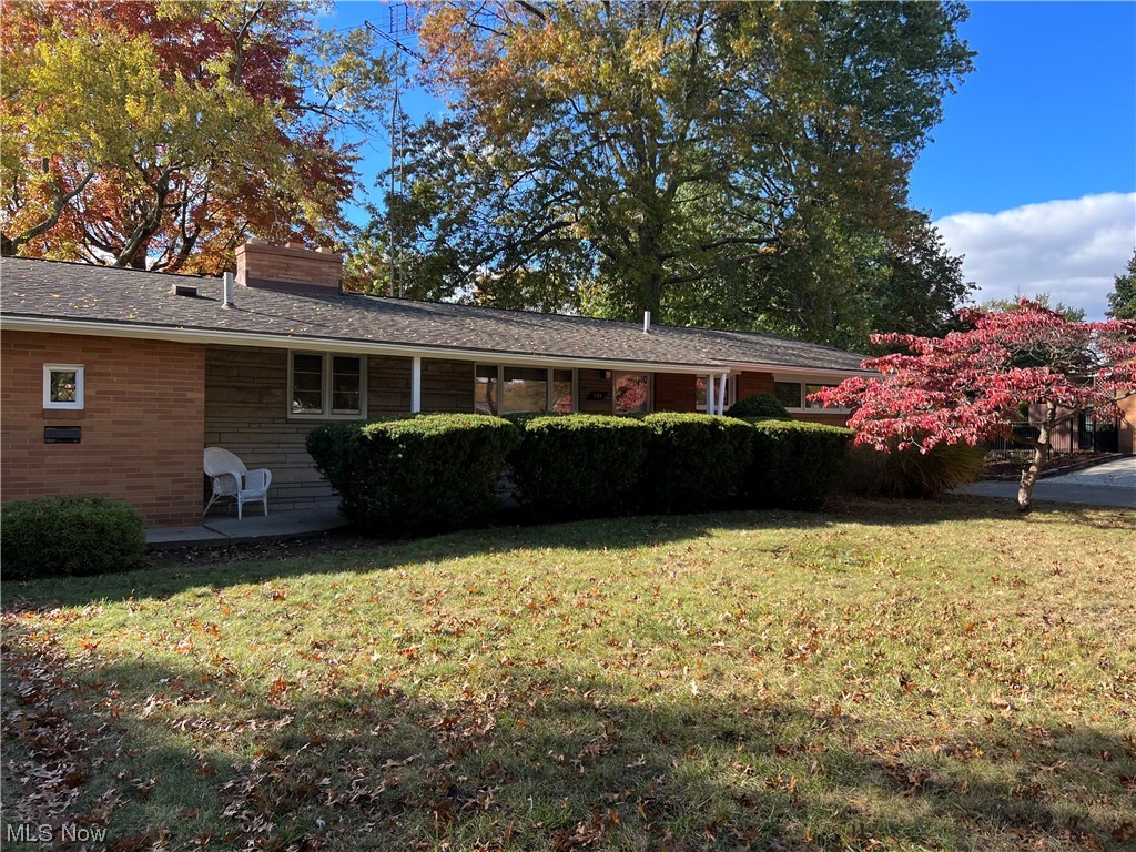 BRAND NEW furnace and AC! The heavy work has been done for you! Wonderful opportunity to get into this fantastic neighborhood before the holiday season begins! This super clean ranch is the perfect home to build some instant equity with just a few simple touches. Originally a 3 bedroom, a previous owner removed one wall to turn one bedroom into more of an office/den, but could easily be converted back into the 3 bedroom. Super open and spacious, the living room has a gorgeous brick wall with fireplace and another full wall of windows to the back yard! Beautiful wood floors thru most of the home. One full bathroom in the hallway, and the main bedroom has a 1/2 bath as well! Enjoy the outdoors under the covered patio in either the back yard or on the covered front porch. Too cold to be outside? Then come inside and build a fire in one of the two fireplaces! Finish the basement to enjoy it's fireplace. Not only does this home have those amazing features, but it also has a ROOF that is roughly 10-11 years young, freshly painted inside and out, new toilets and more. Around 2010 the basement was waterproofed and a sump pump was added. Basement glass block windows were also installed. Seller does not have info on the waterproofing details. Truly a great home that you will not want to miss. This home is absolutely to be sold AS-IS and seller will not make any repairs. NO FHA.  Call your favorite realtor and get in to see this home!