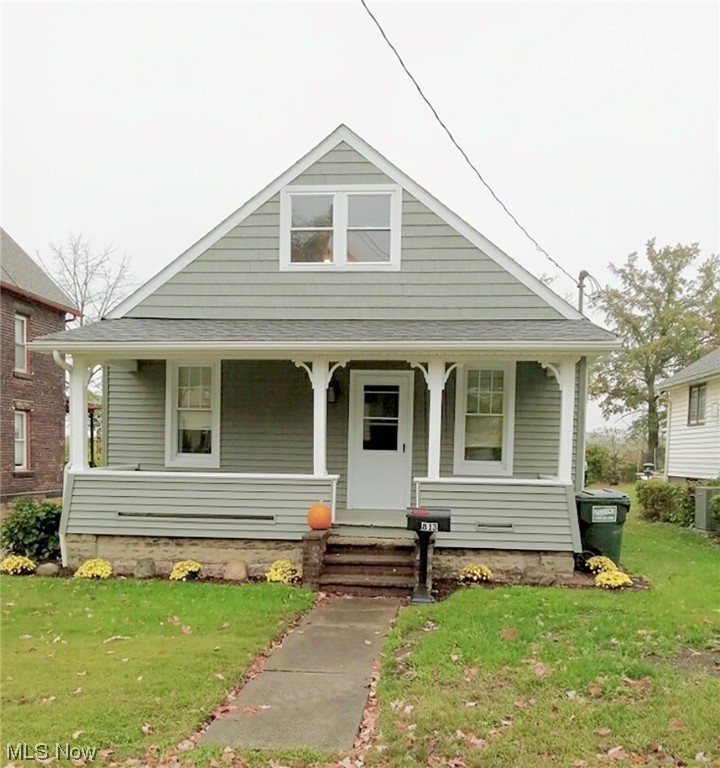 Move into this updated 3 bedroom 2 full bathroom bungalow in Massillon City. This home has been tastefully updated and has a first-floor bedroom, laundry, and 2 full bathrooms. The spacious living room, kitchen, and dining area complete the main floor . Upstairs there are 2 additional bedrooms. The home has been freshly painted throughout, all new flooring, gorgeous original woodwork, and built-in storage. The lower level adds additional living space and is partially finished with a recreation room, 2nd laundry hookup area, and plenty of storage space. So many updates - New siding 2023, Gutters and downspouts 2021, and underground downspout drains 2023, New deck 2023, interior and exterior paint 2023. New carpet and LVT 2023, newer windows, new furnace, Newer roof, updated plumbing and electric, and more. Give me a call to set up your private showing.