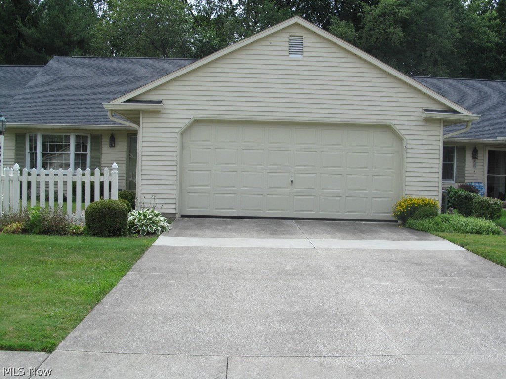 One owner condo in 55+ community.  Covered entrance to foyer and large great room with vaulted ceiling and skylights, ceiling fan.  Can accommodate formal dining.  Glass door from great room to sun room, surrounded by windows, providing a wooded view.  Kitchen includes eating area, bay window, large pantry, built-in desk, lazy Susan.  Master has walk-in closet, private bathroom, linen closet.  Second bedroom has 2 closets, private bathroom, linen closet.  Close to great shopping and expressway.  Must see.  Home Warranty.