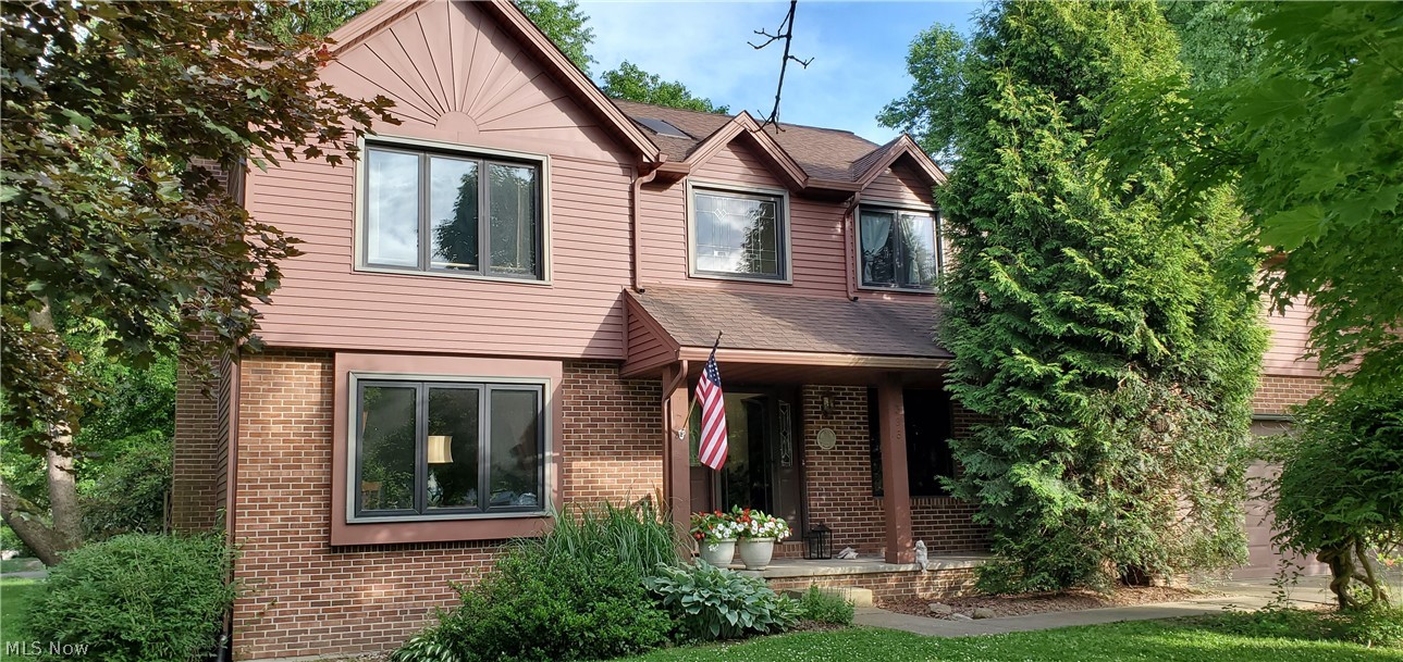Welcome to 398 Rivermoor Dr  Suffield  Township in beautiful  Rivermoor Estates. 3 1/2 Baths - 3 Bdrms. Master Bdrm Suite-Walk in Closet, Master Bath-Soaking Tub $ Shower. sky lite. Another full bath to service 2 -Bdrms upstairs. 2 Story Foyer-Window on 2nd floor matches lead glass windows in ft door & panels.  Main Floor with 1/2 bath serves as Laundry Rm, washer & dryer stay in closet. Large Great Rm w/sunken flooring & fireplace for comfy warmth, Dining Rm w/gorgeous leaded glass chandelier. All appliance Kitchen w/new dish washer, newer frig-French Doors w/lower freezer. Newer sealed 2" THICK Hickory Wood counter tops. Kitchen has beautiful views of gorgeous fenced backyard. 3 Season Rm w/vaulted ceiling, 2 sky lite & heated for cooler weather. Sliding glass door to patio. Lower Level-Rec Rm was a man cave. Wet Bar includes 4 bar stools. Also an office could be used as 4th bed Rm w/lg closet. L/L Bath Rm w/shower. Utility Room-Kinetico Softener, 95% Furnace, Air, A O Smith Hwt 2017