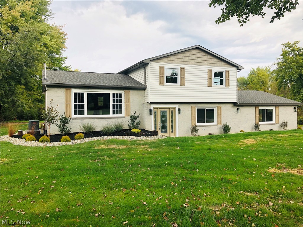 Newly Renovated Home - 3 Beds, 1.5 Bath on an expansive 3+ acre lot sits a completely renovated home that includes a new roof, siding, gutters, septic system, professionally waterproofed basement, sealed driveway, natural stone retaining wall and a custom deck that flows into a brand new interior through French doors.
As you enter you will notice an open concept follows you into a custom eat-in kitchen designed with concrete countertops, a marble backsplash, all new high end appliances, cabinets and a commercial sink. Also included: 2 car dry walled attached garage, New Bathrooms, New custom windows, Furnace, A/C, Water Heater, Flooring, Sump pump, & New Railings!!