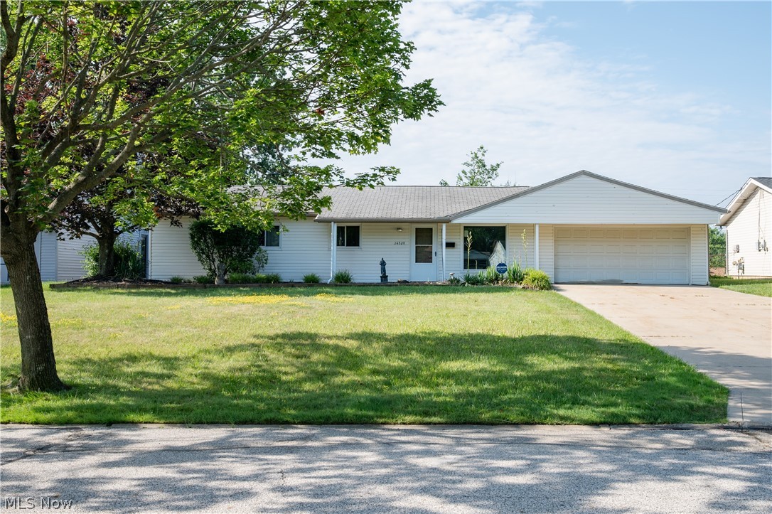 Well-maintained 4-bedroom, 2-bath ranch with nearly 1,800 sq. ft. of one-floor living. The inviting family room features beamed ceilings and a fireplace, creating a great space to relax or entertain. Additional amenities include first-floor laundry, central air, an attached 2-car garage, and a patio overlooking the backyard. A new roof and new front siding are scheduled to be installed in late July/early August, adding even more value and curb appeal. Move in and make it your own!