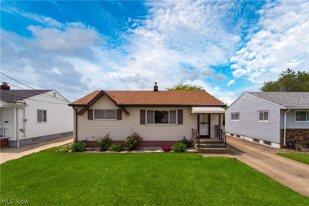 Welcome home to this move-in ready 3 bedroom, 2 full bath ranch in Brook Park!  This home has been well cared for and maintained throughout the years.  The main floor features new neutral gray paint (2019) and brand new carpet (2019), with gorgeous original hardwood floors in two of the bedrooms.  The main level bathroom has a large, walk-in shower and good size vanity.  Walk through the ceramic-tiled dining room and kitchen to step out back onto your private covered patio.  The backyard is fully fenced in and comes with a shed.  Back inside the house, the basement offers a large rec room, full bathroom, spacious laundry room, and separate storage area.  Updates within the past 10 years include:  Gutter guards on house and garage, new shed, new wash basin, furnace and AC, glass block windows in the basement, new windows, garbage disposal, stove, refrigerator, garage door, and vinyl siding.  Quiet street with convenient access to highways and shopping.  1 year home warranty included for