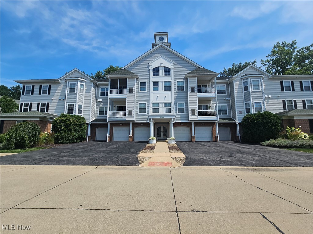 Welcome to The Aquamarine in Avon Lake.  This 2/2 first floor condo offer a short walk to the clubhouse and pool.  Easy access to private garage, and easy living.  The Aqua features greenspace and walking trails plus a beautiful clubhouse with pool, workout room, resident gathering spaces, a pub, and social events throughout the year.  This Outrigger floorplan has an open great room to kitchen flow, laundry utility room, loads of closets and storage, and a very spacious primary suite.
