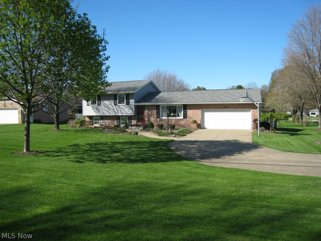 Welcome to 7621 Mudbrook in the heart of Jackson Township. This adorable home sits on .55 acre which is fenced in for privacy with beautiful mature trees. The spacious living room flows nicely into dining room. Adjacent is an awesome three season room perfect for entertaining.  The walk to schools, park and local shops and restaurants makes this home the perfect location. Updates include new roof, hot water heater, 10x12 storage barn, A/C and carpet. Move in ready, won't last!