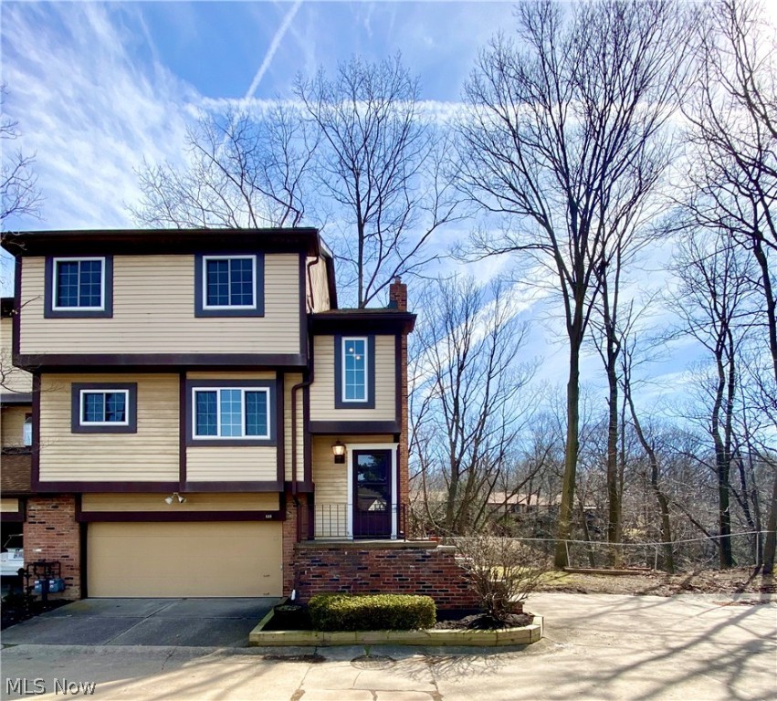 Gorgeous end unit 2 bedroom 2.5 bath townhome in the middle of Cleveland Metroparks Euclid Creek Reservation with the most magnificent views of nature! If your soul calls for natural light and contemporary Earth tones, CHECK THIS PLACE OUT! Gorgeous bright sunken living room with focal point 3 panel window sliders leading to the second floor porch. The views are simply breathtaking! Breakfast bar with pendant lighting leads into the 'U' shaped prep area of the very spacious eat-in kitchen fully loaded with included stainless steel appliances. Updated half bath finishes the main floor. The 2nd floor starts with a bonus loft area perfect for a library, yoga area or office space! Freshly painted full bath with beautiful built -in. 1st bedroom is spacious with 2 closets. Master bedroom is large & bright with a big walk-in closet & 2nd closet with front loading washer/dryer. Ensuite updated full bath with full vanity, tile floor, glass enclosed shower with 2 shower heads & built-in seat, pr