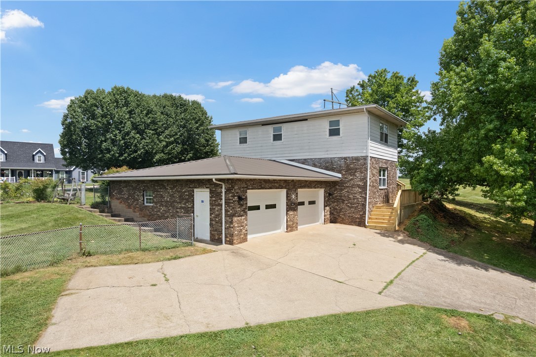 Welcome to this split-level home situated on a generous plot of land, offering plenty of space to enjoy the outdoors. The expansive yard provides endless possibilities for gardening, recreation, entertaining, or simply relaxing while taking in the peaceful surroundings. This property is conveniently located with easy access to Belpre, Parkersburg, and surrounding amenities, as well!

The home's exterior has been well cared for and features attractive updates that enhance both curb appeal and long-term value; it is an excellent opportunity for buyers seeking space, a well-maintained exterior, and the flexibility to make the interior their own. Inside, you'll find a functional split-level layout with spacious living areas ready for your personal touch. Whether you're looking for room to spread out inside or outside, this property offers the perfect combination of comfortable living and usable land.

Our goal with this remodel was to complete all the big items and price it accordingly so someone can remodel this cosmetically as they see fit. Life-time guarantee on all structural/waterproofing work; new HVAC; plumbing upgrades and new water tank; and added downspouts with new drain lines.

Schedule your private showing today!