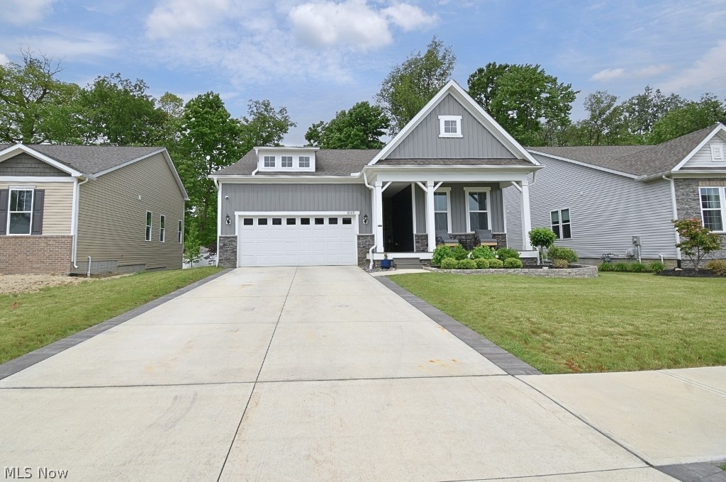 Beautifully maintained 2023 ranch offering the perfect blend of style, comfort, and functionality with 3 bedrooms, 3 full baths, and a versatile flex room with elegant French doors. Designed with both everyday living and entertaining in mind, the open-concept layout showcases luxury vinyl flooring throughout the main living areas, while a stunning 10-foot quartz island serves as the centerpiece of the chef-inspired kitchen. Natural light pours into the sunroom, creating a bright and inviting space to relax. The spacious living room features a built-in surround sound system, making movie nights and entertaining effortless. Retreat to the luxurious primary suite complete with dual vanities featuring quartz countertops, a spa-like glass-enclosed shower with quartz seating and inlaid stone flooring, and a generous walk-in closet. The finished lower level expands your living space with a large family room, additional recreation area, third bedroom, and full bath—ideal for guests, extended family, or multi-generational living. Curb appeal shines with professionally designed landscaping and a welcoming front porch. Enjoy outdoor living on the rear deck equipped with built-in speakers and outdoor fan hookups. Additional upgrades include LeafGuard gutters for low-maintenance peace of mind and a transferable builder warranty for added confidence in your investment.