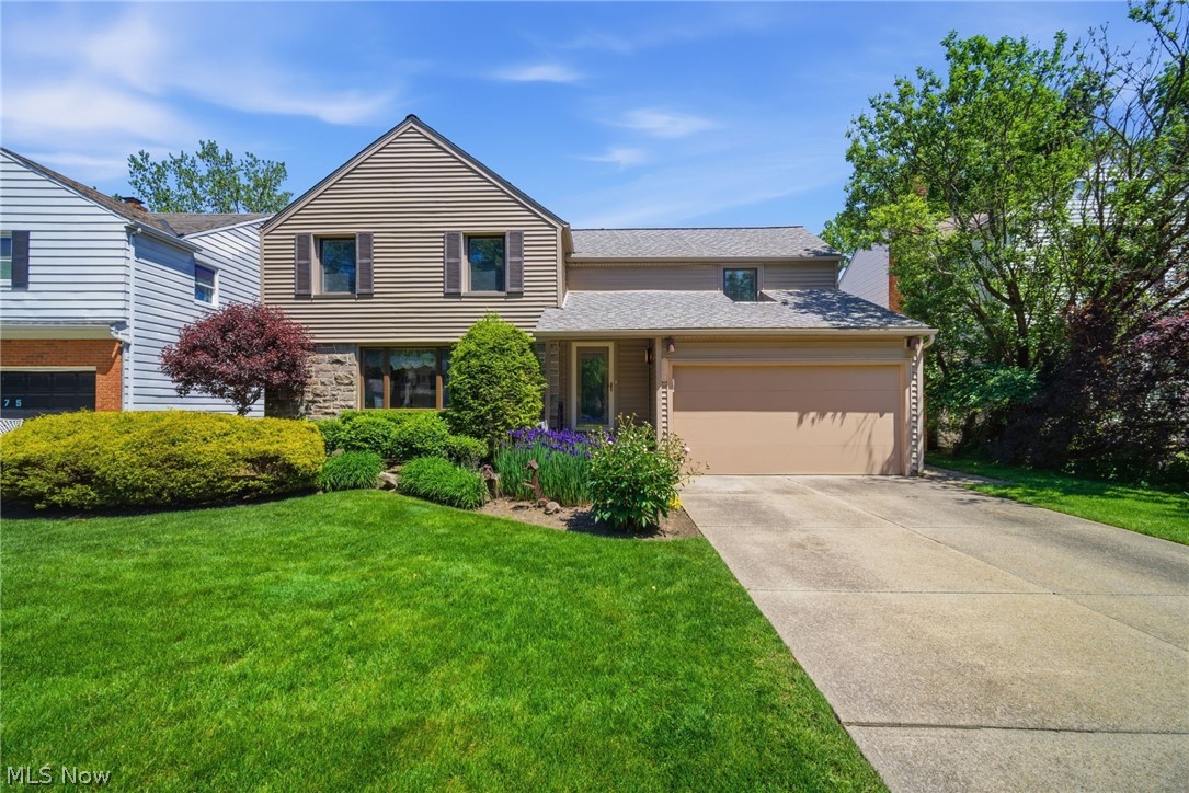This one of a kind home offers OVER 3,100 SQ FT ABOVE GROUND with an additional finished lower level, a rare opportunity in the heart of South Euclid. Featuring 4 oversized bedrooms, 3 full bathrooms, and 1 half bath, this meticulously maintained home combines exceptional space, character, and functionality. The spacious kitchen offers a nice amount of cabinetry, counter space, and double ovens, making it both functional and inviting. The expansive family room with dramatic stone fireplace overlooks the beautiful private backyard and patio, creating the perfect setting for entertaining or relaxing. This immaculate home offers incredible curb appeal, lush landscaping, and pride of ownership throughout. Upstairs you will find four exceptionally large bedrooms. Master bedroom and fourth bedroom are a tandem setup that can easily be transformed into 2 separate bedrooms by connecting to the hallway, or can be used as office space, nursery space, and more. The spacious primary suite features a full private bath, while another bedroom also offers its own full bathroom in addition to a full hallway bath upstairs. Additional highlights include a first floor laundry room/mud room, oversized living and dining spaces, custom built ins, attached two car garage, and an incredible layout rarely found in the area. With over 3,100 sq ft above ground, beautiful living spaces, and endless possibilities, this home truly has so much to offer and will be gone before you blink.