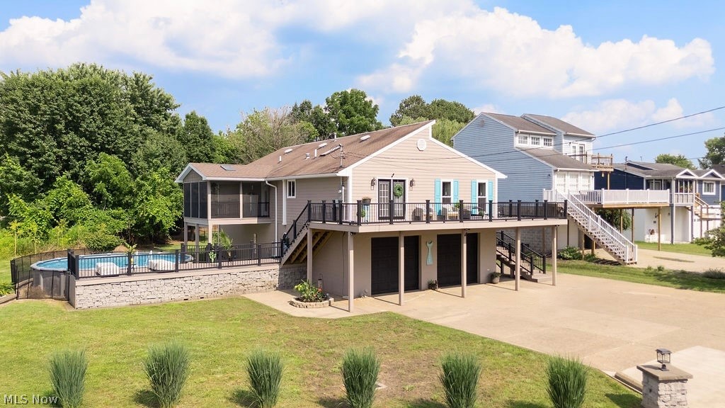 Perched to capture breathtaking views of the Ohio River, this stunning home was thoughtfully designed for effortless entertaining and everyday enjoyment. Wrapping Trex decks, a screened patio, and expansive outdoor living spaces create the perfect setting to soak in peaceful surroundings from nearly every angle. The sparkling pool, complete with a new pump and cover, means more time relaxing and less time maintaining. Inside, beautiful wood floors flow seamlessly through an open-concept layout filled with natural light. Skylights enhance the airy feel, while custom trim work throughout adds warmth and craftsmanship. Nearly every window frames another picturesque river view. The spacious kitchen features granite countertops, updated appliances, wood cabinetry, a charming coffee bar, and a center island with seating. The primary suite is generously sized and offers a spa-like bath along with a walk-in closet. A well-appointed guest bedroom and an additional full bath provide comfortable accommodations for family or visitors. A bonus room on the main level makes an ideal office space or offers easy potential for a third bedroom giving you flexibility to grow. The main-level laundry center adds everyday convenience and practicality. The lower level features walk-out access to nearly half an acre of lush grounds, complete with a dedicated dog run and space for gardening, recreation, or play. You’ll also find a gym room and plumbing already in place for a future half bath, expanding the possibilities even further. An oversized two-car garage provides ample space for vehicles, storage, and all your river essentials — kayaks, fishing poles, and more. A central vacuum system adds another layer of ease. Quality construction, a prime river location, high-end finishes, and thoughtfully selected upgrades make this home stand out in every way. This is more than a home, it’s a riverfront lifestyle that makes everyday feel like a vacation.