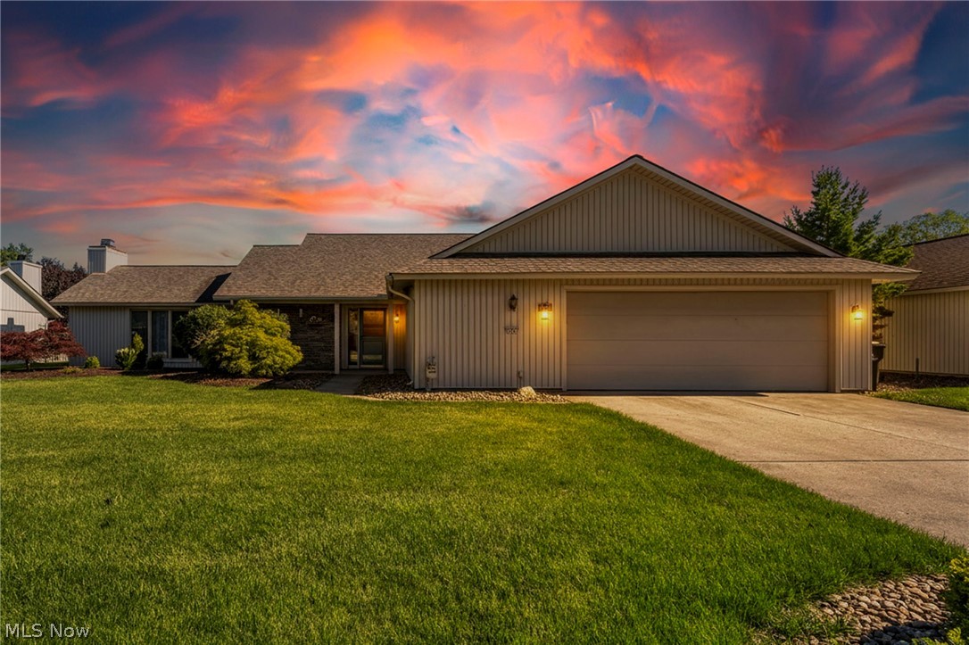 Welcome home to this beautifully maintained original-owner ranch in the highly desirable Ridgefield community! Offering over 2,300 square feet of single-floor living, this custom Bob Schmidt-built home features 3 bedrooms, 2 full baths, a spacious open floor plan, and stunning floor-to-ceiling Pella casement windows that fill the home with natural light. The inviting great room showcases a gas fireplace, while the sunroom addition provides the perfect space to relax and enjoy views of the private backyard. Thoughtful built-ins throughout the home, including a dedicated office area off the primary suite, add both character and functionality. Recent updates include luxury vinyl flooring and carpeting (2022), updated second bath (2025), new heating and air conditioning system (2025), vinyl siding (2014), and roof (2011). Located on a quiet cul-de-sac within Ridgefield, residents enjoy access to community amenities including a pool, clubhouse, fitness center, playground, and year-round activities. A rare opportunity to own a meticulously cared-for home in one of North Ridgeville's most sought-after neighborhoods!