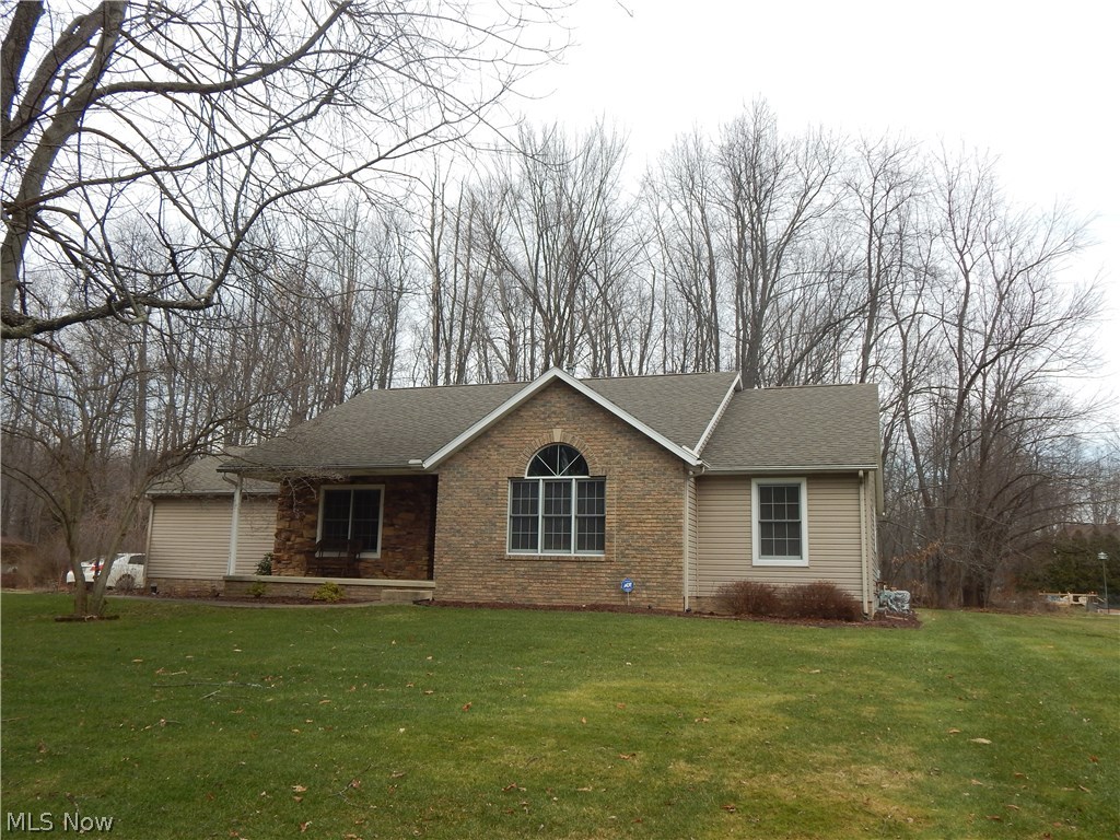 Irresistible comfortable ranch style home featuring Beautiful vaulted Great room with gas fireplace. Enjoy the tasteful chef's special kitchen, Vaulted ceiling, fully appliance, island breakfast bar. Formal dining room that could be used for the casual owner as first floor Den/Office. Many upscale features, walk in closet in master bedroom, Vaulted ceiling with bright open window featured in second bedroom. First floor laundry and enjoy your summer days on the approx. 25x25 freshly stained deck. Patio, oversized attached two car garage. You have to view the open stairway to lower level. Offering second mini entertainment kitchen large size family room with gas fireplace,  elaborate Billiards area for all the challenges of family games and play. Oversized full bath in lower level, along with storage room/utilities. This is a very well cared for home sitting on over 1 1/4 acres over looking wooded area. Call this home today.