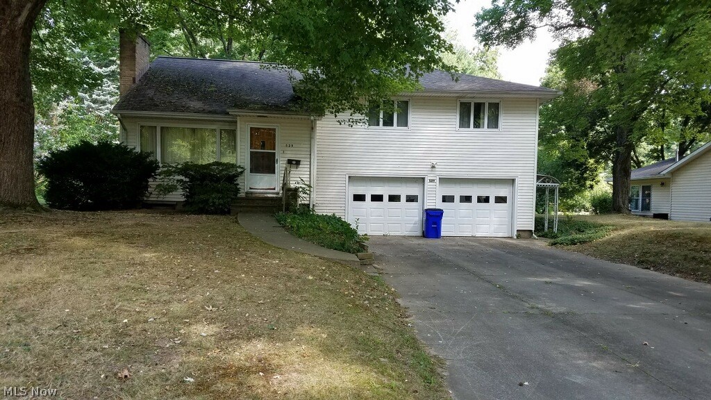 Great neighborhood! Lots of room for growing. 3 bedroom, possible 4th bedroom on 3rd floor,  bath and 1/2. Half bath is in garage. Large garage. Roof 2007, siding 1997, new furnace and A/C 2020