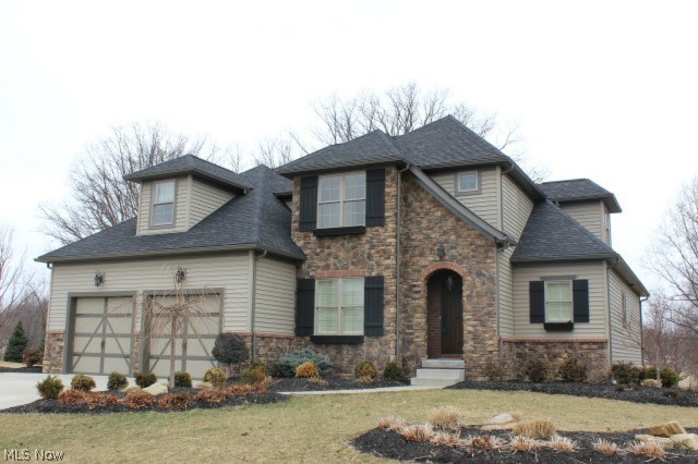 Gorgeous colonial beautifully designed & constructed situated on golf course*Custon Built 2010 w/5bds,1st flr master, 3.5baths,4337SF incl walkout LL rec rm w/kit,play rm & full ba*Great rm w/frpl, coffered ceiling & bookcase that opens to hidden office/computer rm*Oak flrs entry,kit & dining*Gourmet kit w/custom cabinets,farm house sink, granite,stainless appl, island/breakfast bar, butler pantry w/microwave, wine fridge & walkin pantry*Mud rm off kit w/blt in cubbies,cabinets &ironing bd*1st flr master w/access to balcony*Master ba w/custom cabinets, granite, jetted tub, oversized tiled shower w/2 shower heads*Walkin w/builtin drawers,shelves & shoe rack* 1st flr laun w/blt in cabinets, folding table & ironing bd*Upper level w/4 generous sized dormer bds w/walkin closets & full ba*Volume ceilings, crown molding, arched doorways, Anderson wndws* approx 14 course base w/poured walls(ICF),glass blk,dbl door entry* covered balcony*PEX plumbing (no copper)*partially covered paver patio*