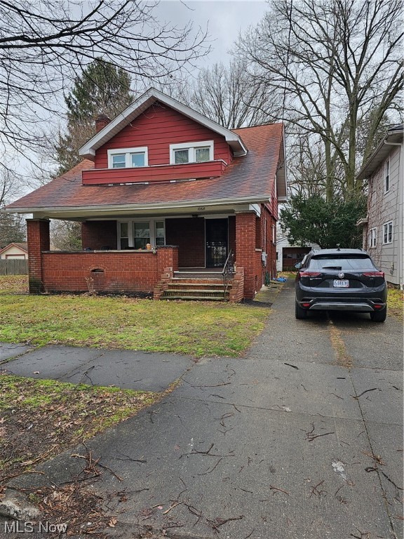 ATTENTION INVESTORS: Great Opportunity exists here with this solid brick 3 Bedroom 1 and a half Baths colonial  ( features generous size rooms),complete with the following updates and improvements newly decked front porch, solid and spacious, new windows through out, including basement windows, new electrical service and electric meter at the street as well as newer panel inside. Newer furnace, HW tank, and new roof. There is hardwood floor under all carpeted areas, and could be quite nice if finished and poly coated.  Nice porch off front door. Deck needs power sprayed .  Also features nice back yard and a detached 1 car garage. Here is your opportunity to really make this property shine. Seller is not physically able to clean  out or do any repairs or updates to the inside and therefore pricing the home with that in mind and will need some assistance with the coordination with closing to allow them time to facilitate the removal of personal belongings at closing.  Seller also request showings only with after offer is made. All access will be granted at this time, (PLEASE UNDERSTAND THAT SELLER IS NOT ABLE TO ACCOMMODATE  MANY SHOWINGS DUE TO HEALTH CONCERNS).