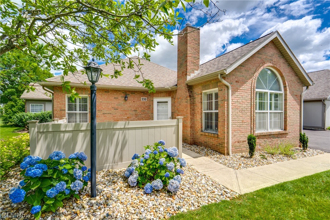 Welcome home to 230 Whippoorwill Ln, a beautifully updated, move-in-ready ranch condo offering the ultimate in comfortable, one-floor living. Situated on a prime corner lot, this immaculate 2-bedroom, 2-full-bathroom home is just steps away from the community clubhouse and swimming pool. Inside, you will find a bright, modern interior featuring gorgeous new luxury vinyl plank flooring throughout the main living areas, gas log fireplace, vaulted ceilings, and brand-new, stainless steel appliances in the kitchen. The primary suite serves as a private retreat with its own updated, modern shower. Enjoy the convenience of a dedicated main-level laundry room, wall-to-wall carpeting in both bedrooms, and an attached one-car garage. Whether you are looking to downsize or simplify your lifestyle, this turnkey gem offers the perfect blend of modern convenience and resort-style neighborhood amenities. Schedule your private showing today!