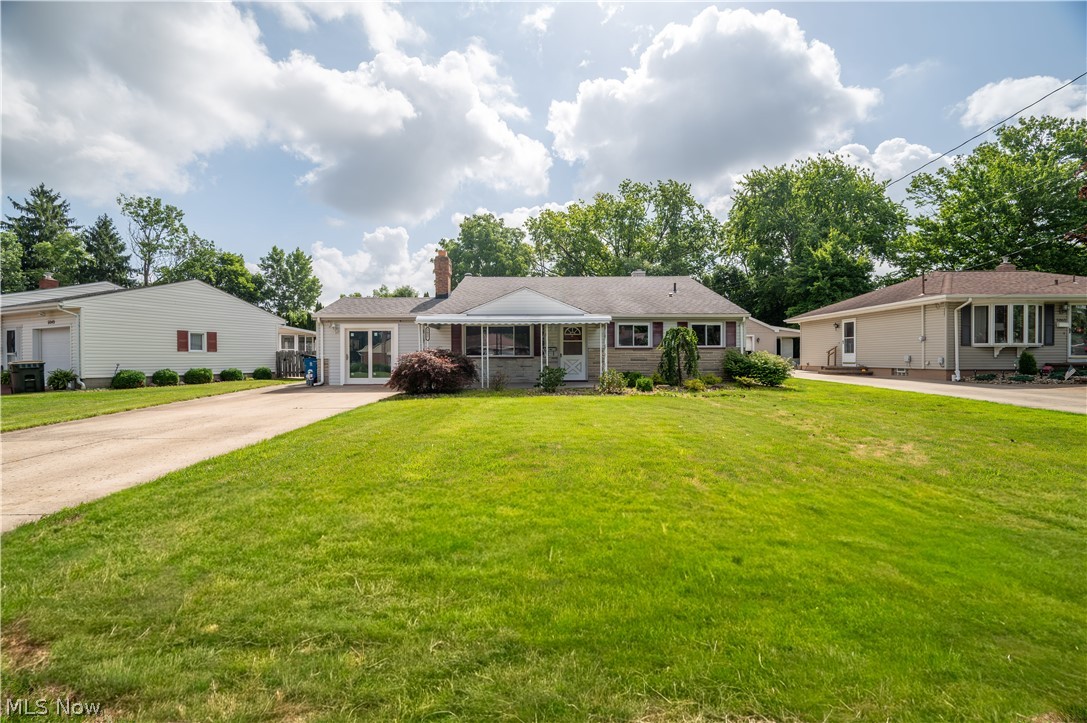 Welcome home to this well-maintained 3-bedroom, 2-full-bath split-level offering a comfortable layout, functional space, and thoughtful updates throughout. Freshly painted interior and a move-in ready condition provide a clean, inviting feel from the moment you enter.
The main level features a comfortable living room highlighted by a beautiful white-washed style fireplace, creating a warm focal point for everyday living and entertaining. Tile flooring runs through the kitchen and main living areas for durability and easy maintenance, while brand-new carpet has been installed on both sets of stairs, the upstairs hallway, and all bedrooms, adding a fresh and comfortable finish.
The lower level offers additional living and utility space, including a full bathroom and laundry area, with walkout access to the exterior for added convenience.
A fully enclosed sunporch extends the living space and provides a relaxing, light-filled area to enjoy in multiple seasons, with access to a concrete patio ideal for grilling, outdoor dining, or entertaining.
A converted attached garage provides flexible space for a workshop, hobby area, or additional storage, featuring brand-new sliding glass doors that bring in natural light and offer easy exterior access.
Outside, enjoy a fully fenced backyard with plenty of room for pets, play, or gatherings. Two storage sheds offer valuable additional storage for tools, equipment, and seasonal items.
With its practical layout, updates, and inviting indoor and outdoor spaces, this home is truly turnkey and ready for its next owner.