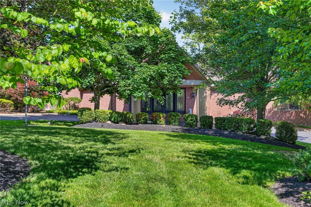 Welcome to this truly unique custom-built residence in the highly desirable Canfield Local School District. Designed by renowned architect Mr Strollo, this extraordinary home showcases exceptional craftsmanship, impressive high ceilings, and a distinctive multi-level design offering the perfect blend of luxury, comfort, and functionality. Step inside the grand 24’ x 12’ foyer, where soaring cathedral ceilings and a stylish wet bar create an unforgettable first impression. The thoughtfully designed floor plan provides generous space for everyday living and entertaining, while two stunning floor-to-ceiling brick and stone gas fireplaces add warmth, character, and architectural presence throughout the home. A standout custom feature is the hand-built wine storage closets with custom glass, designed to hold up to 386 bottles while helping maintain the perfect temperature year-round  ideal for collectors, entertainers, and wine enthusiasts. The home offers four spacious bedroom suites, including a luxurious owner’s suite. Each bedroom features its own private full bathroom and walk-in closet, providing exceptional comfort, privacy, and storage for family and guests. A dedicated den offers the perfect space for a home office, library, or additional sitting area. Convenience and efficiency are found throughout, including four furnaces, a sprinkler system, a convenient laundry room, and abundant storage. The 13’ x 16’ playroom offers great flexibility as a recreation room, media room, fitness area, or additional living space. Step outside to your private backyard retreat featuring a spectacular three-tier deck overlooking the swimming pool and beautiful outdoor setting.A massive wraparound driveway provides ample parking and enhances the home’s impressive curb appeal. Rarely does a property of this caliber come to market. With unmatched space, privacy, versatility, architectural design, and a prime Canfield location, this exceptional residence is truly a must-see.