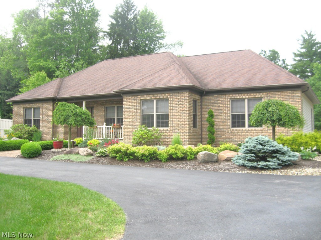 PRIDE OF OWNERSHIP is evident in this exceptional ranch built in 2001 situated on 1 acre. Professional landscaping, absolutely beautiful! 2231 sq ft plus additional 1897 sq ft finished lower level - 4078 total sq ft. 3 Bedrooms, 3 1/2 Baths, Dining Room, 1st Floor Laundry. Kitchen  - Cherry cabinetry, corian counter tops & stainless appliances. Breakfast Room - great views for morning enjoyment. Foyer & Great Room - w/cathedral ceilings, stone fireplace, two sets of French doors to Deck overlooking heated in ground pool. Vinyl fencing adds to the privacy of this tranquil setting. Attached 2 - 1/2 Car Garage with 1/2 bath for swimming convenience. Detached 3 plus Car Garage. First Floor - 9 foot ceilings, 6 panel doors, hardwood flooring, & cherry woodwork. Lower Level - all oak trim & carpet. Family Room corner fireplace w/blower. Oak Kitchen - fully appliance with corian counter tops. Pool Table Room - pool table stays! Full Bath. To many amenities to list. CALL FOR AN APPOINTMENT. Ho