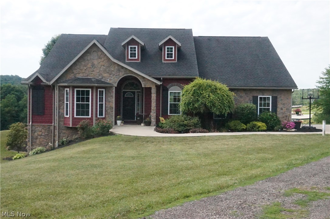Check out this home with 5 acres and a fantastic setting in the western Holmes County countryside. As you turn in you drive down the long driveway back to this lovely house on the hill. The home is a 4 bedroom, 2.5 bathrooms, 2,474 sqaure foot ranch home. The large kitchen, living room, and dining area meshes together well with the open concept. The cathedral ceiling and plentiful windows allow a lot of natural sunlight in this area of the house. The master bedroom has a nice bathroom and walk-in closet. The 4th bedroom could be used as an office or playroom. The 2-car attached garage walks into a mudroom and the first-floor laundry. The back deck gives a nice view of the surrounding country and a place to catch some rays by the pool. The walk out basement is open and ready for someone to put their finishing touch on it. There is a shed and outdoor wood burner at the edge of the large yard. Call today for your private showing.